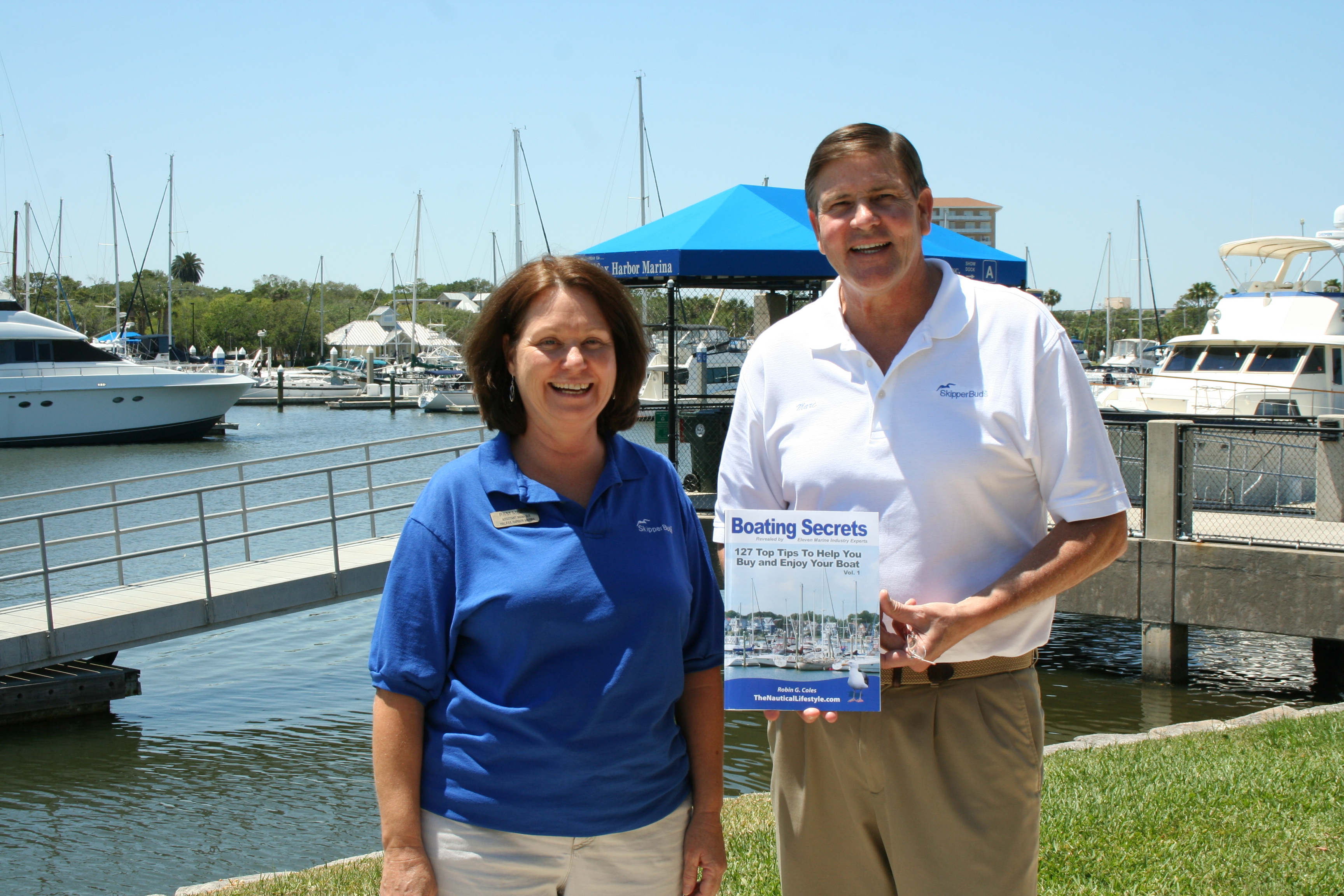 Marc Philips and Pam at Halifax Harbor Marina Daytona FL and Boating Secrets: 127 Top Tips to Help You Buy and/or Enjoy Your Boat Book