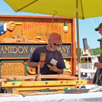 Doug Amidon chiseling wood