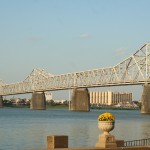 Cyclist and Bridge crossing Ohio River in Louisville